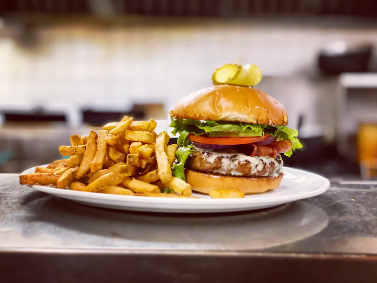 The Cove beef burger with a side of fries