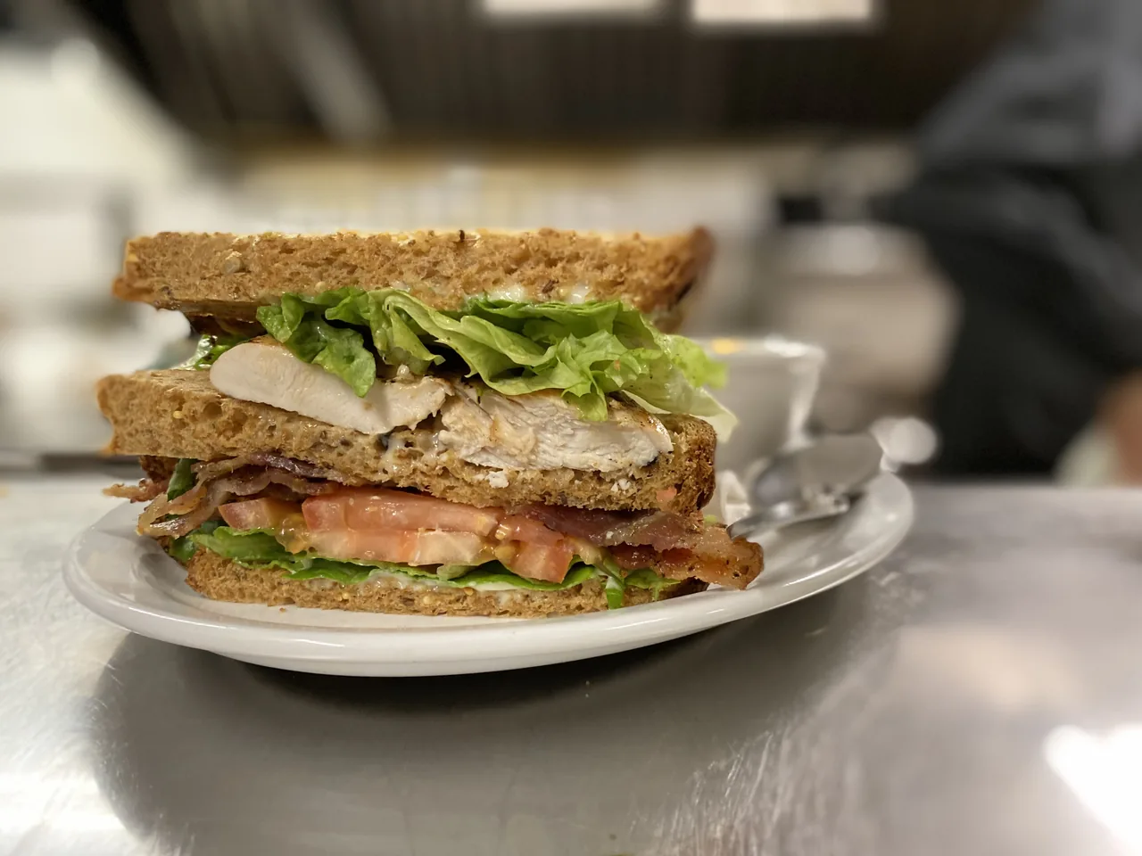 Chicken clubhouse sandwich, stacked and skewered