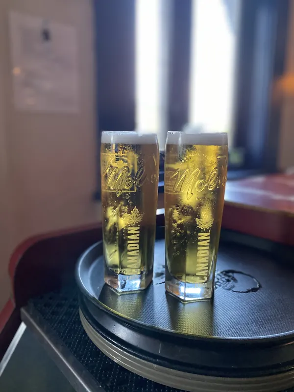 Two lagers on a serving tray