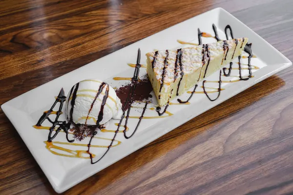 Dessert plate with ice cream and chocolate sauce