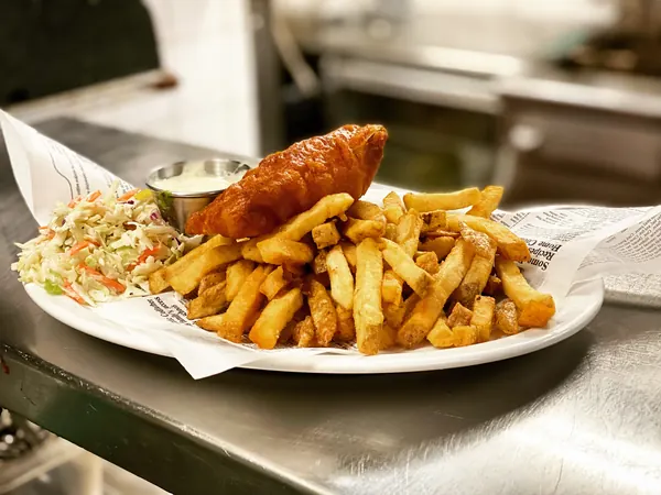 Battered cod with fries, coleslaw and lemon